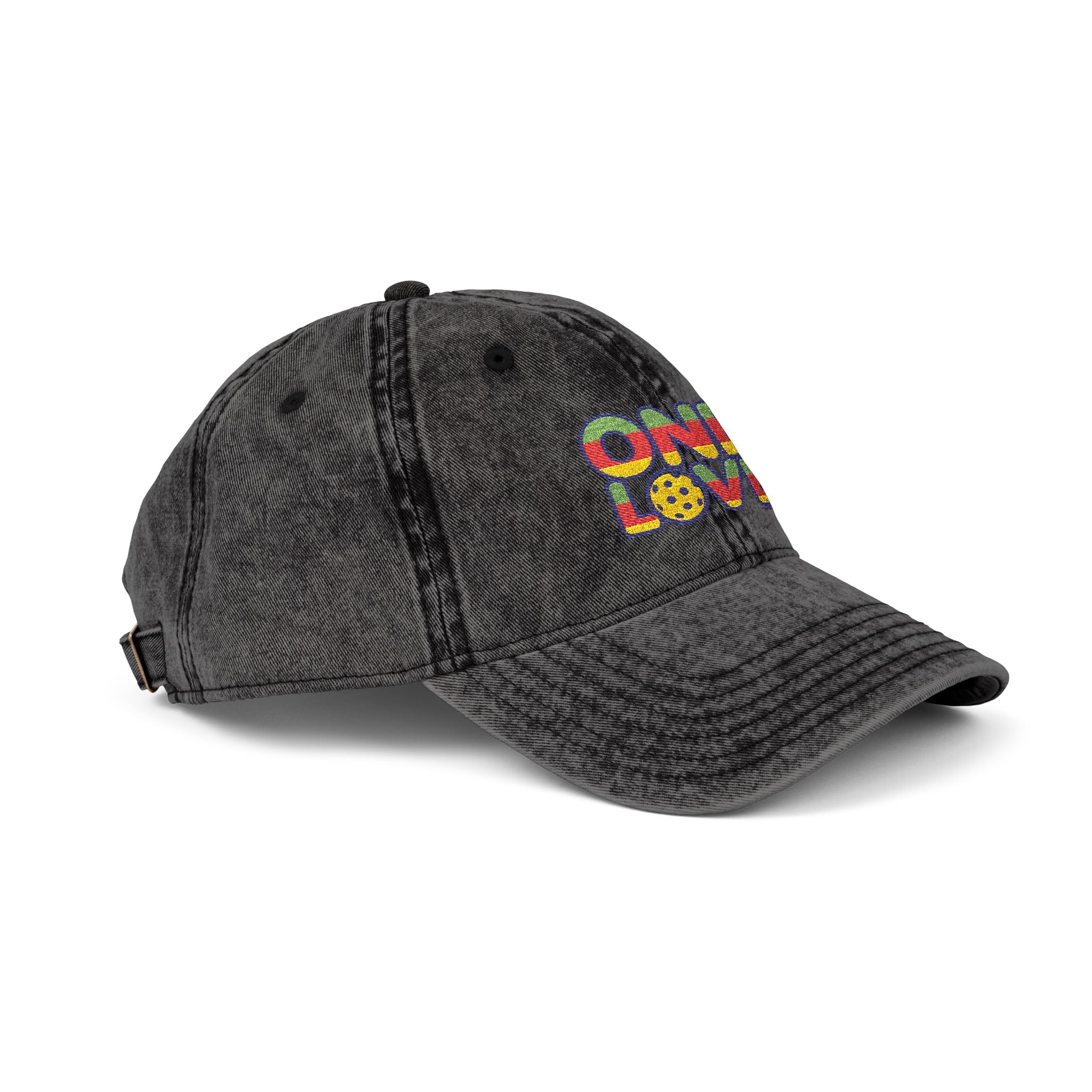 Black denim cap with colorful text on a white background