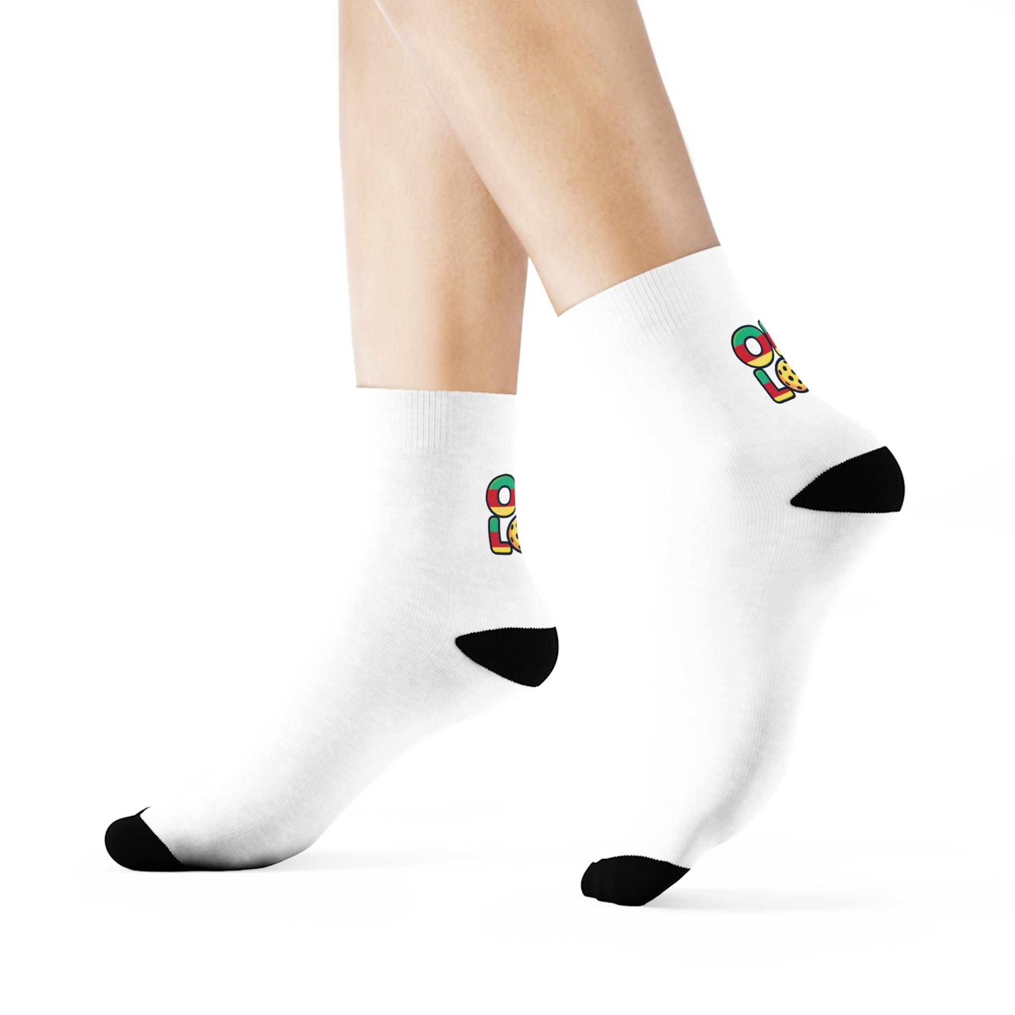 White socks with colorful logo and black toes and heels on a white background